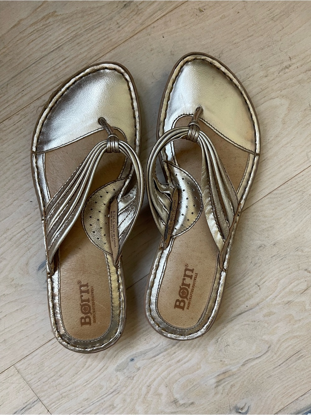 Born size 6, gold metallic summer sandals.